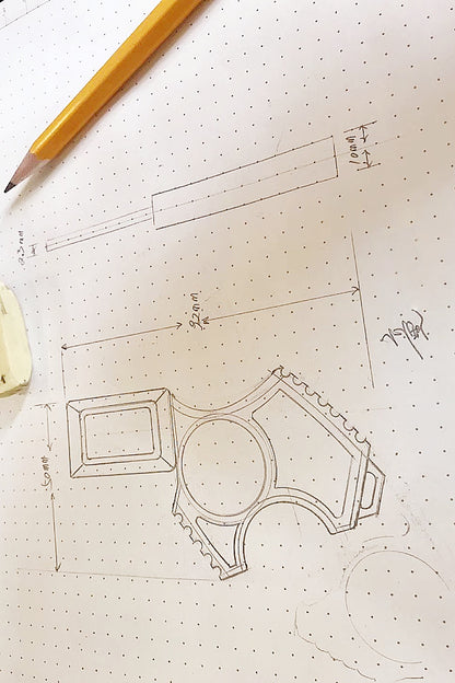 Automobile seat belt buckle