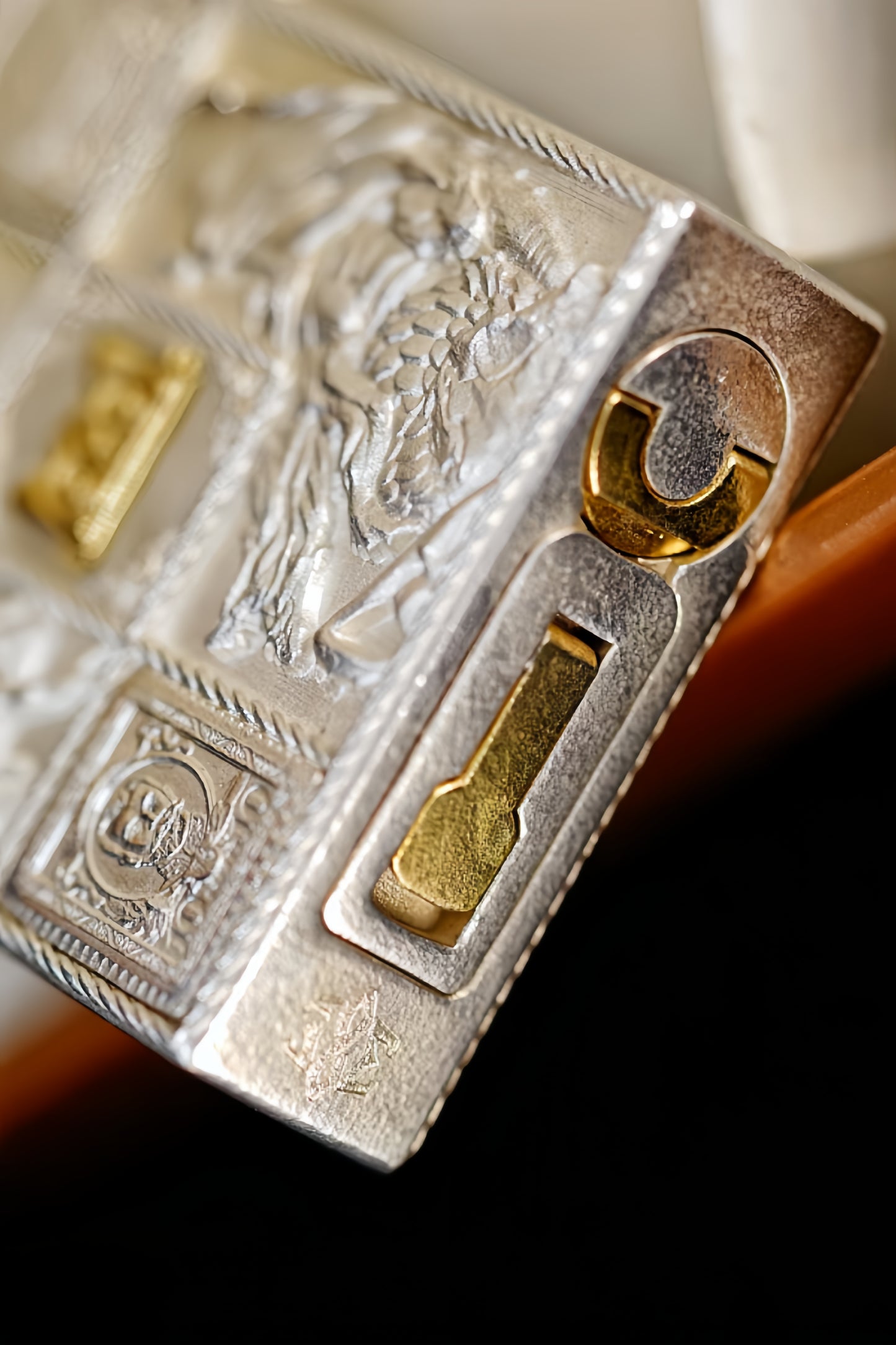 Pure silver lighter with gold inlay