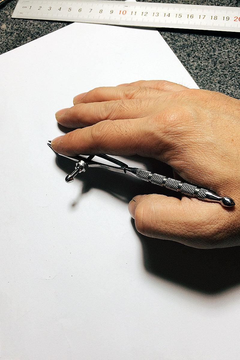 leather stainless steel compass