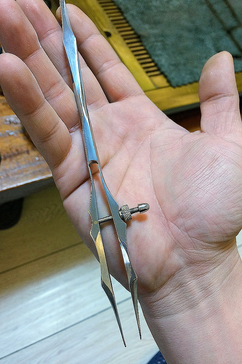 leather stainless steel compass