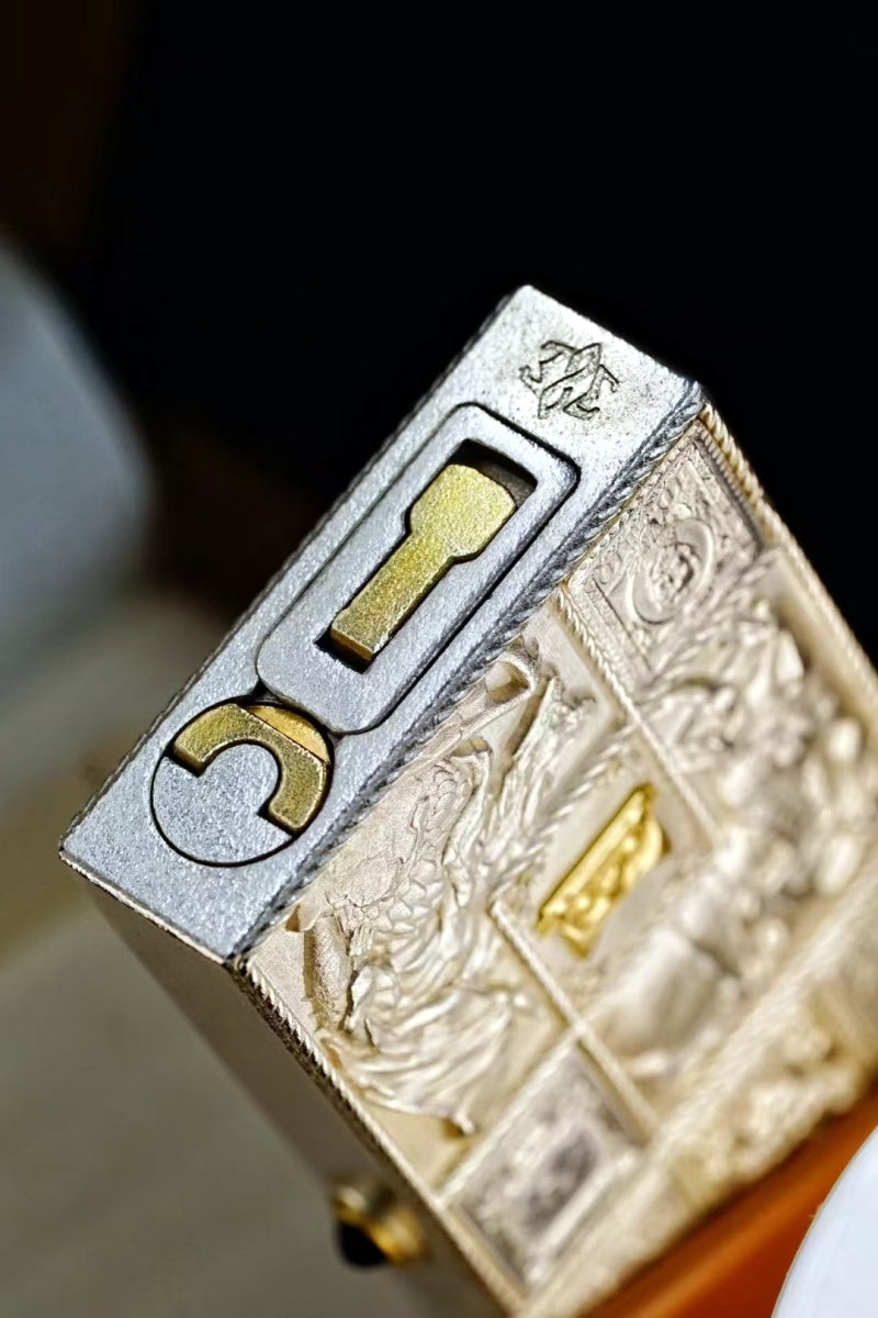 Pure silver lighter with gold inlay