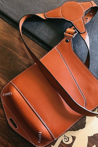 Multifunctional cowhide portable armpit bag