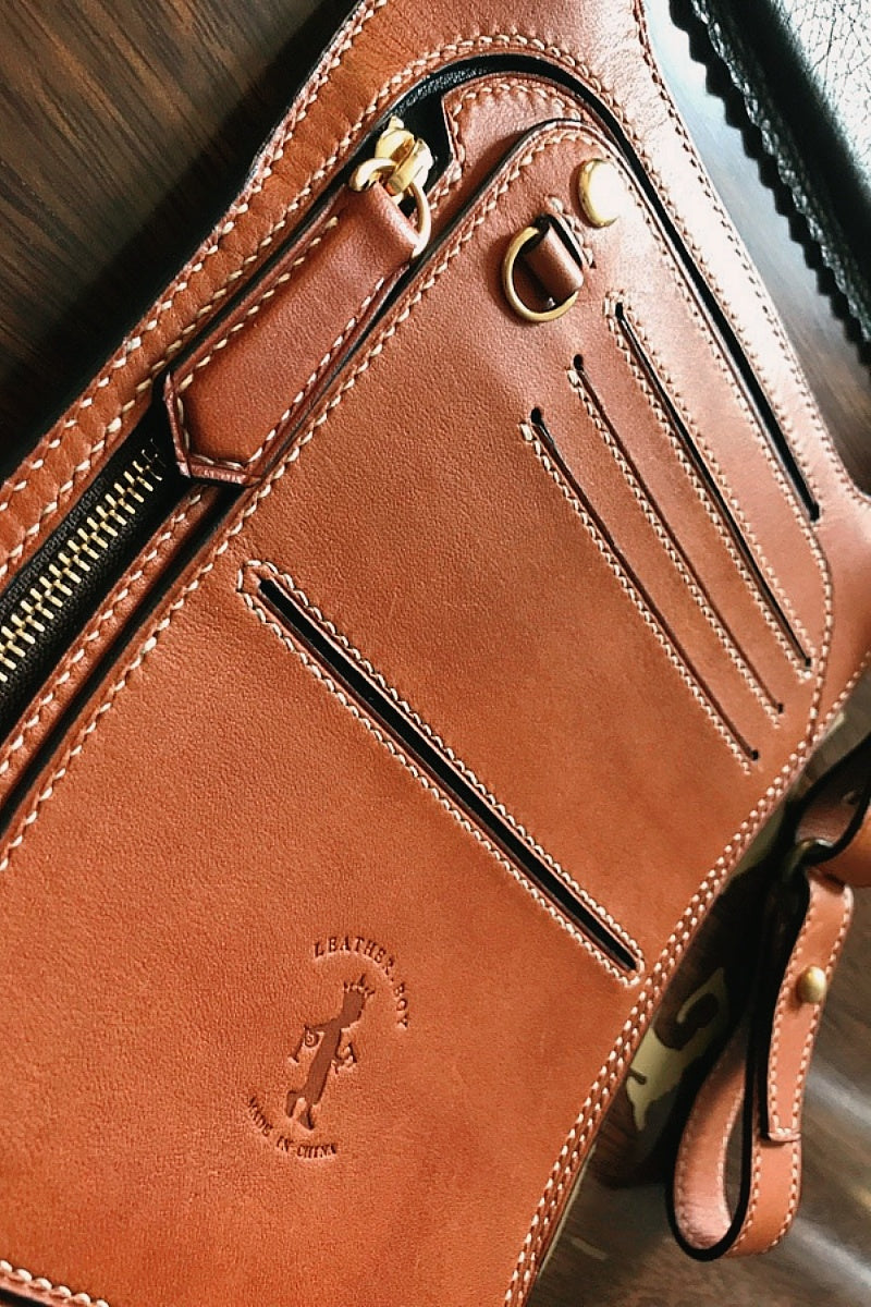 Multifunctional cowhide portable armpit bag