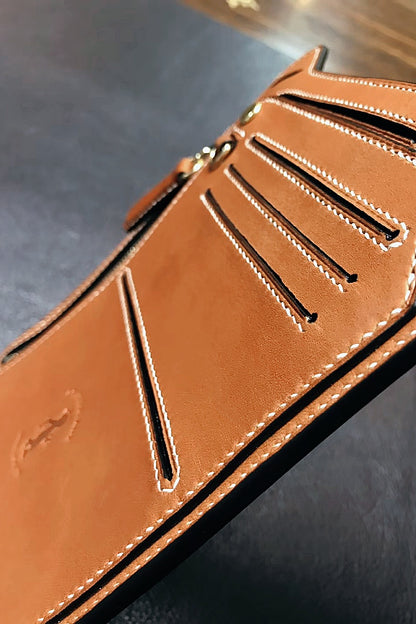 Multifunctional cowhide portable armpit bag